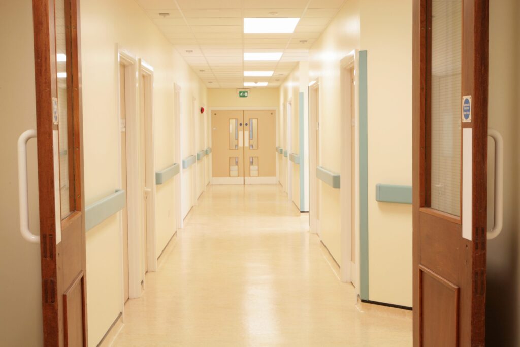 hospital corridor showing open fire doors, internal fire doors